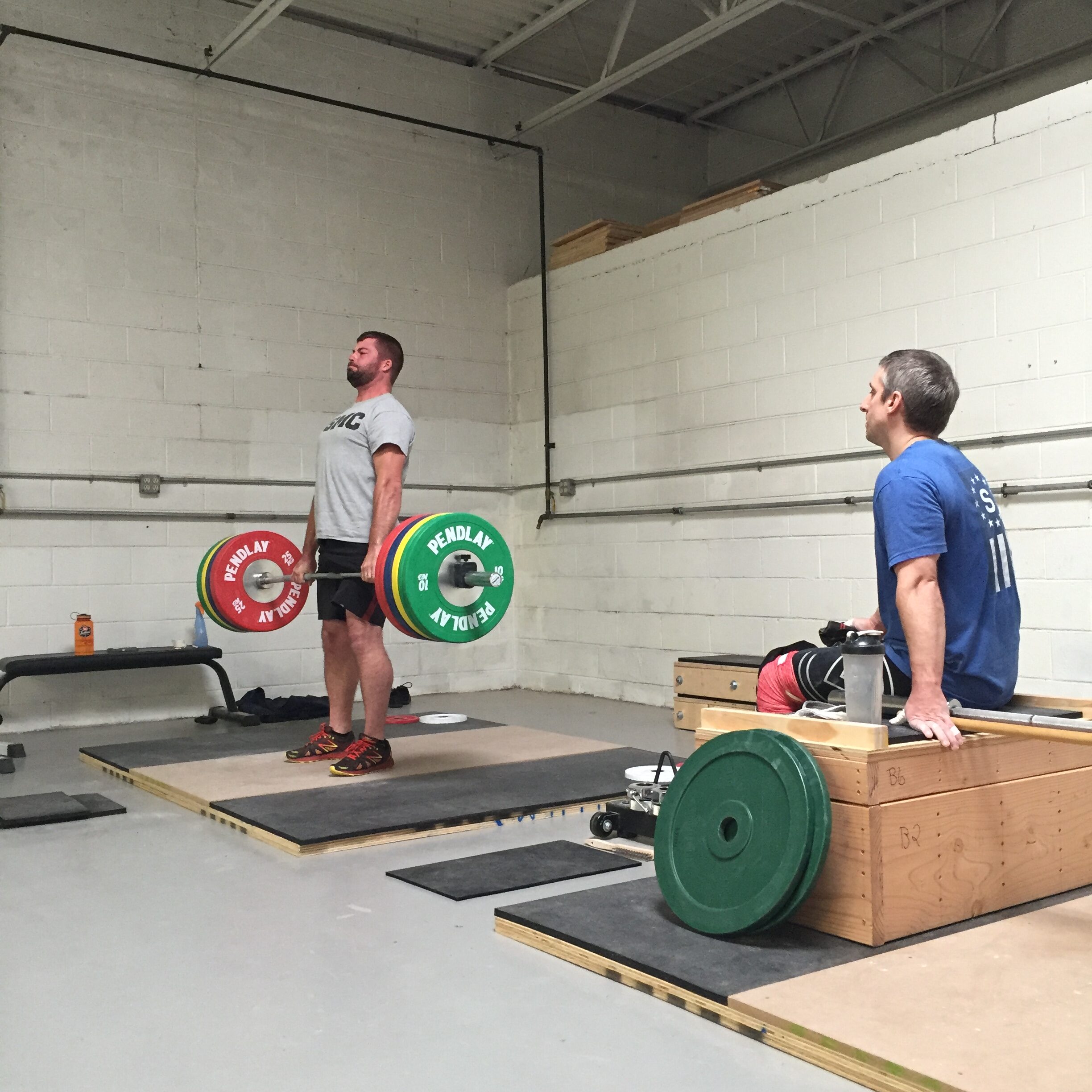 Brian coaching Justin on deadlifts